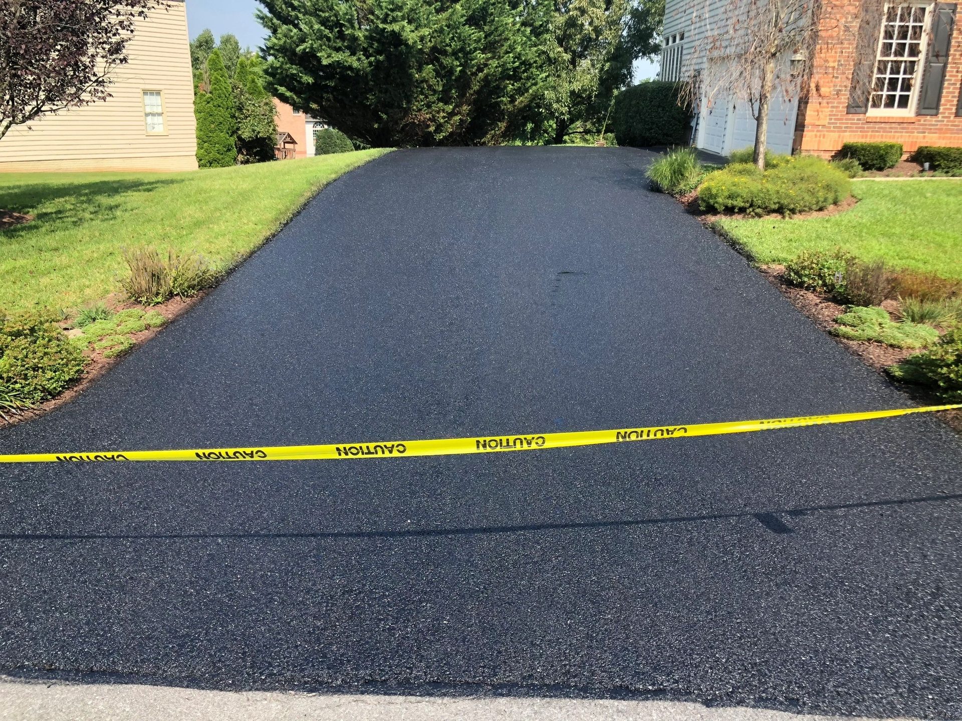 Freshly sealcoated driveway in Ijamsville, Maryland