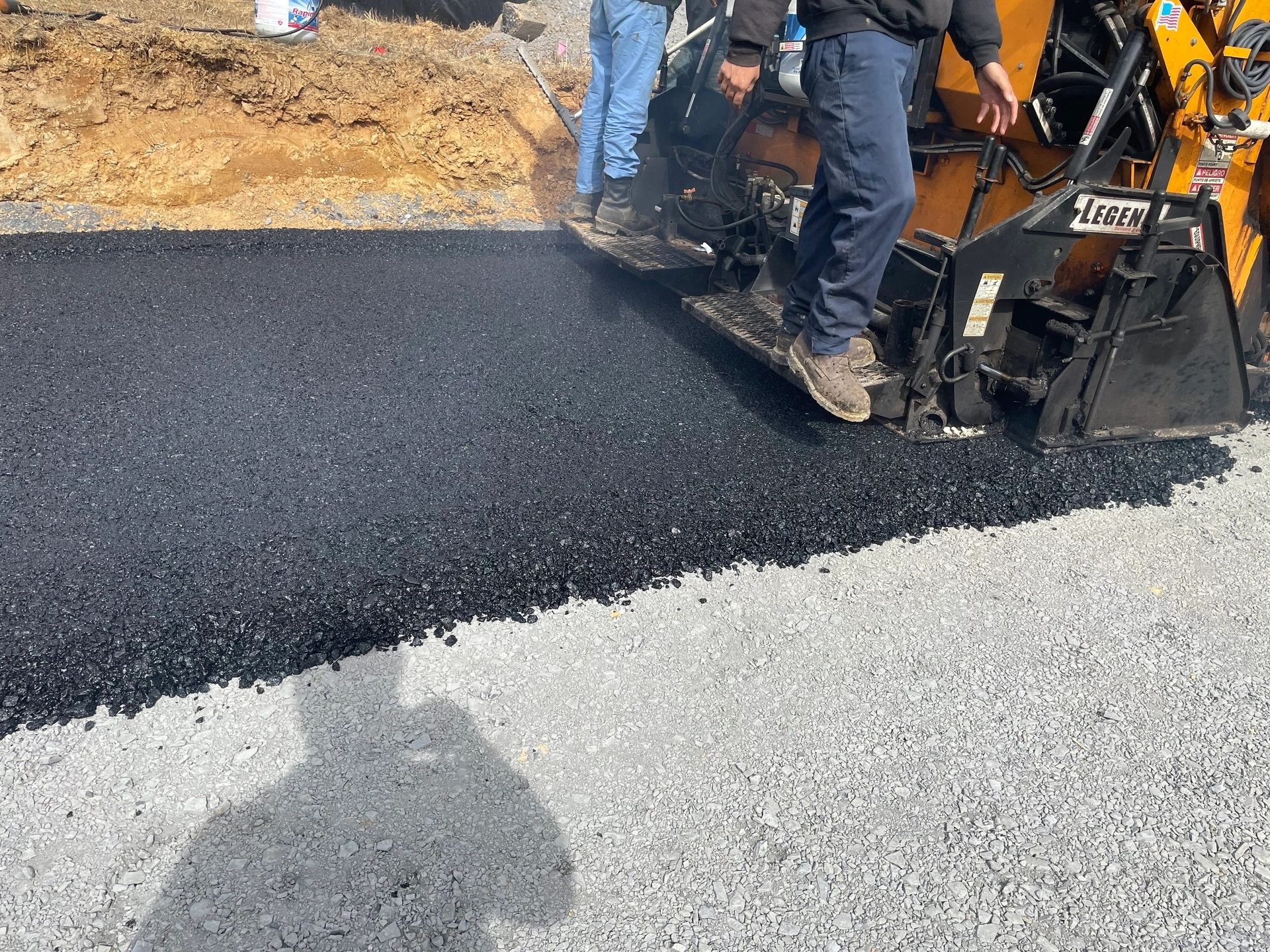 Asphalt base installation in Damascus, Maryland