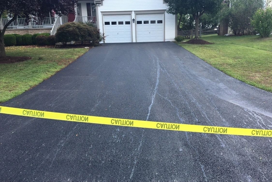 Residential asphalt driveway in Poolesville, Maryland