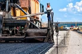 HCS paving crew placing asphalt
